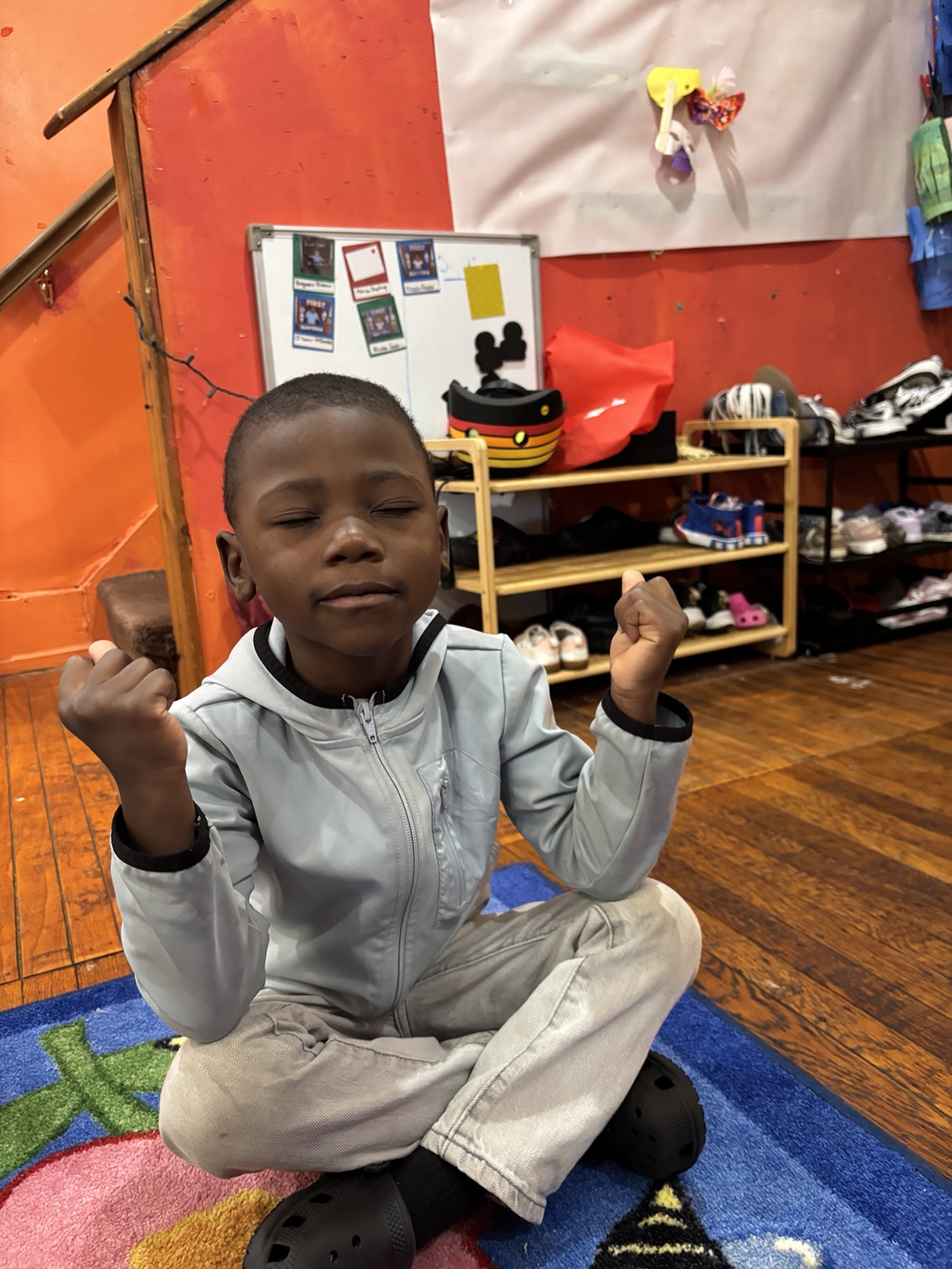 Child practicing a calm-down strategy